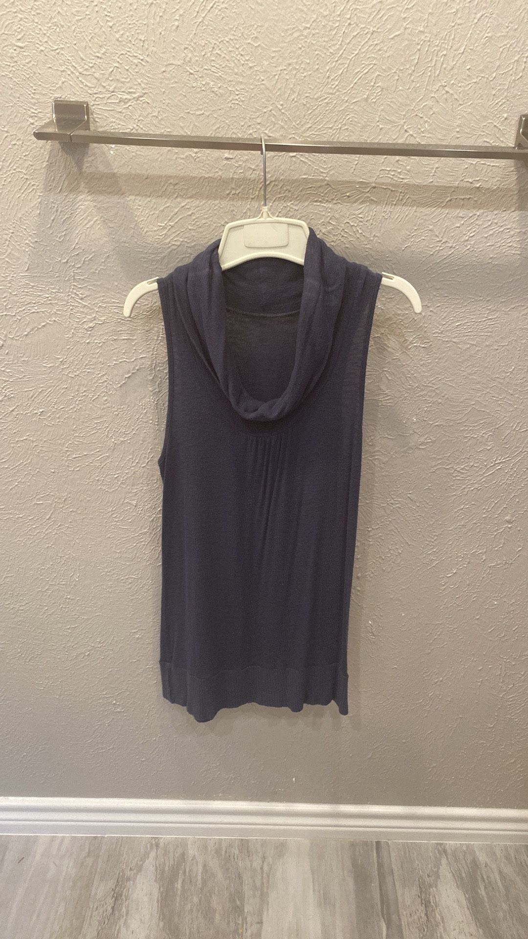 Tank top with cowl neck and ribbed hemline