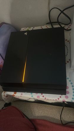 PS4 And Controller And Games