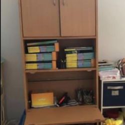Book shelf with a writing desk
