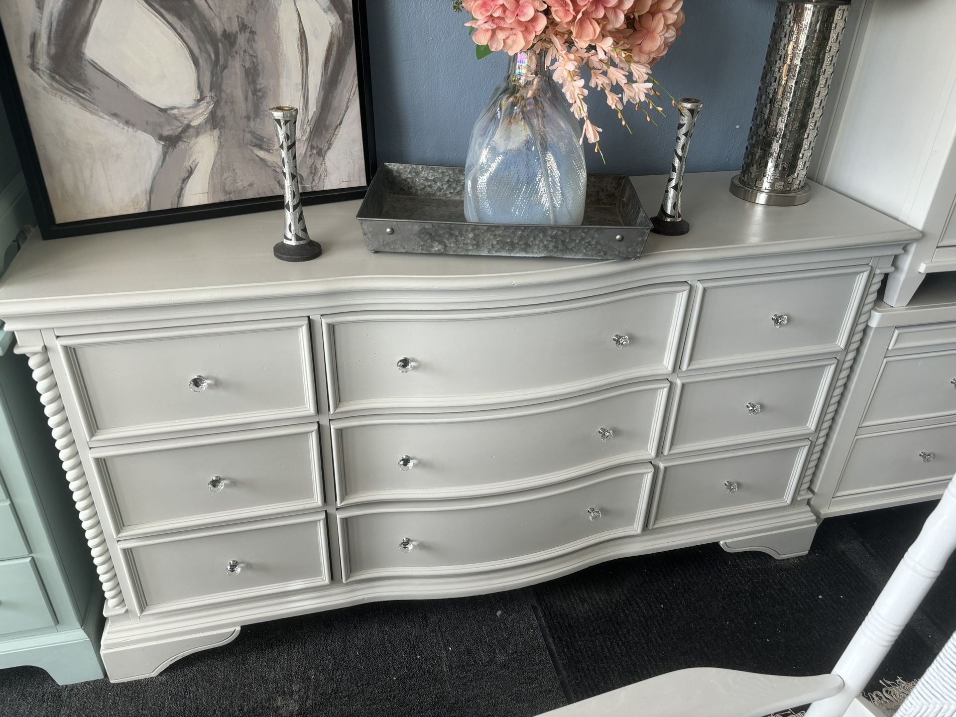 Light Grey Dresser With Decorative Knobs