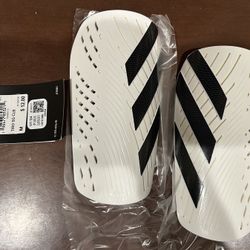 BRAND NEW ADIDAS soccer shin guards (size MED)