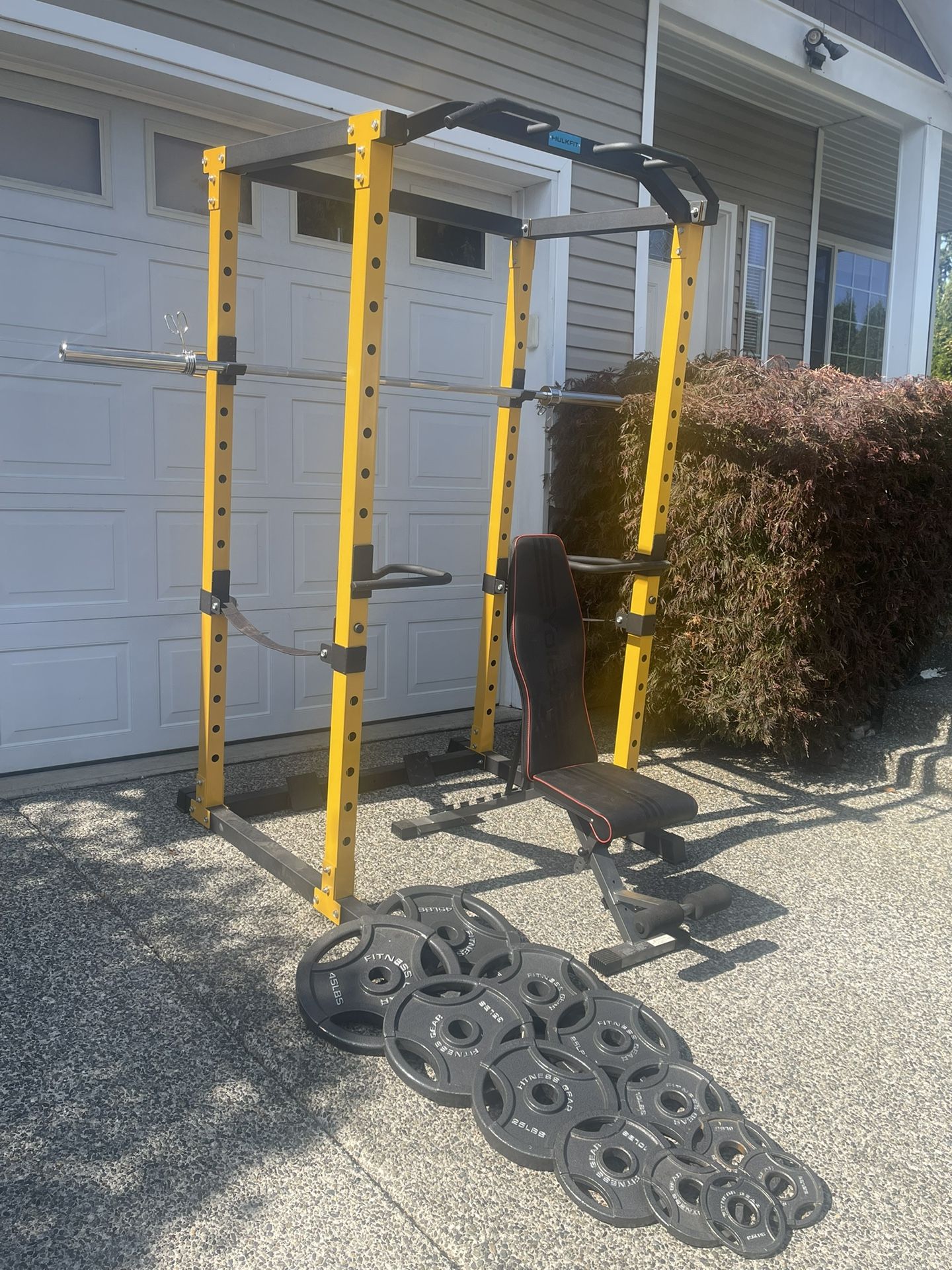 Squat rack,bench,barbell and weights