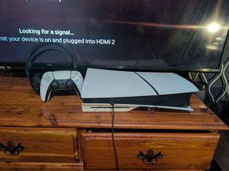 PS5 Slim Disc-edition, 1 controller, 1 headset, and 11 Game discs.