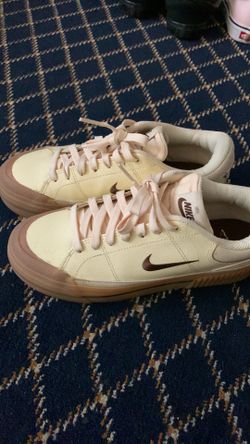 Tan and brown nike sneakers