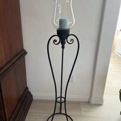 Black wrought iron candle stand