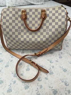 This Is a Louis Vuitton Speedy Bandoulière in the Damier Azur canvas 35