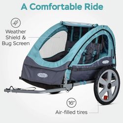 InStep Take 2 Double Bicycle Trailer.  Capacity: Seats two children with a maximum total weight of 80 pounds.  Safety & Protection: Features a 5-point