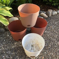 Set of 4 small flower pots