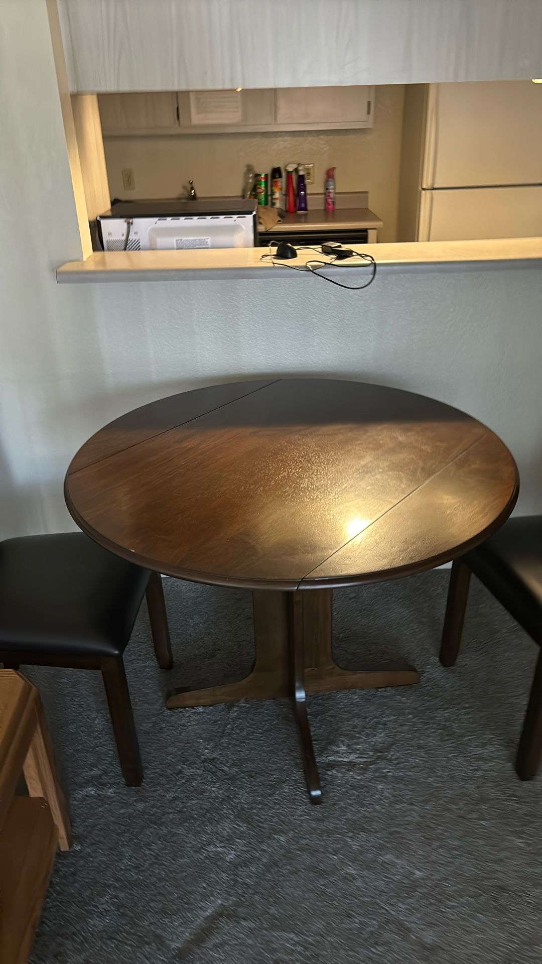 Solid Wood Table With 2 Wood Chairs.