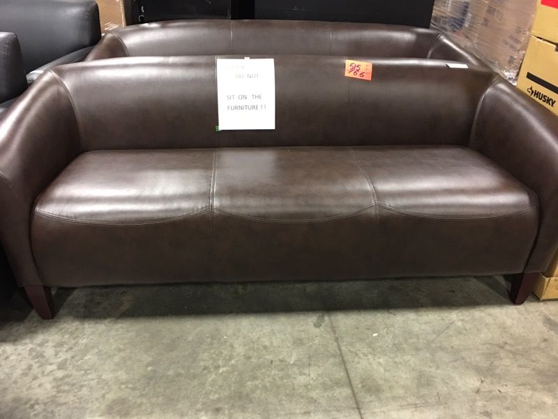 Brown leather like sofa
