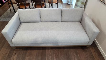 Pottery Barn Upholstered Sofa with Wood Base