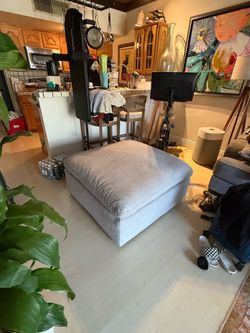Living spaces grey upholstered fabric ottoman 39"W x 40"D x 18.5"H