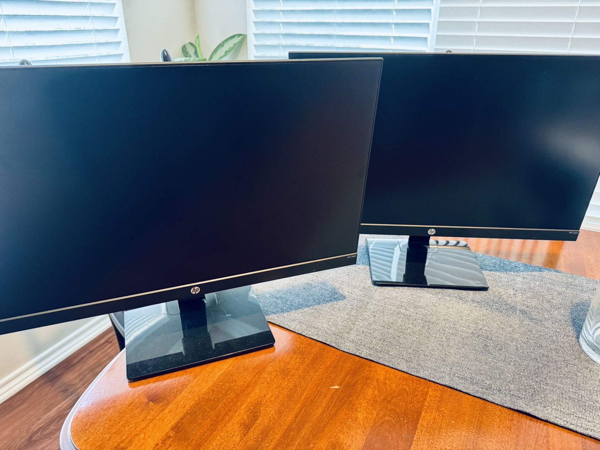 Like New - Two HP 24m - Thin HD adjustable monitors 