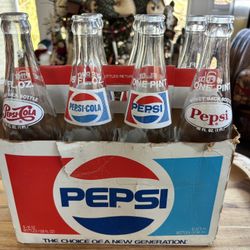 7 - 16 Ounce Pepsi Bottles In Pepsi Carton