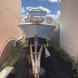 1990 Pro Line 23’8” 