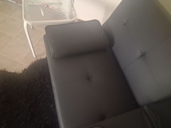 Black leather couch / Bed/ futon