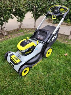 RYOBI self-propelled lawn mower.
