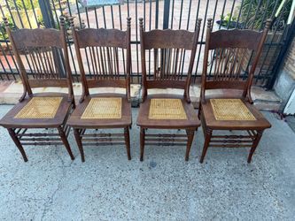 Antique oak pressed back chairs