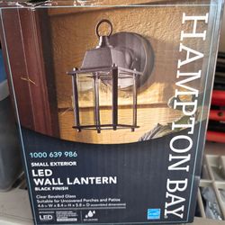 Two LED outdoor light fixtures