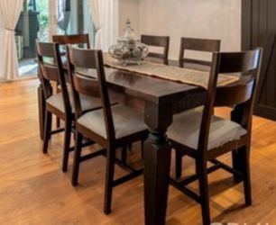 Solid Teak dining table and matching chairs