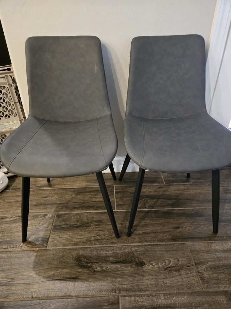 Two Faux Leather Dining Chairs