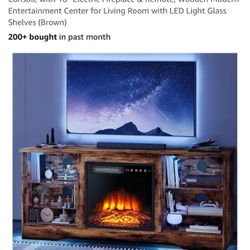 New And unopened box TV Stand with The Fireplace. $200