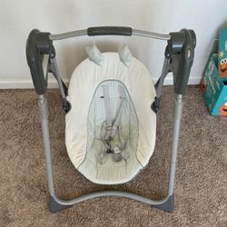 Baby swing ( Used ) 