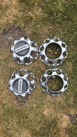 OEM) Ford F-250 / F-350 Super Duty chrome wheel center caps.
