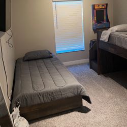 Children’s Bunk/Trundle Bed With Mattresses And Stairs On The Side.