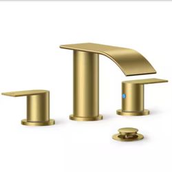 The bathroom faucet is designed with a waterfall spout and extremely thin lines that are both minimalist and atmospheric, matching well with modern de