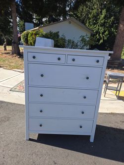 White taller chest Dresser.  Delivery Available For An Extra Fee.