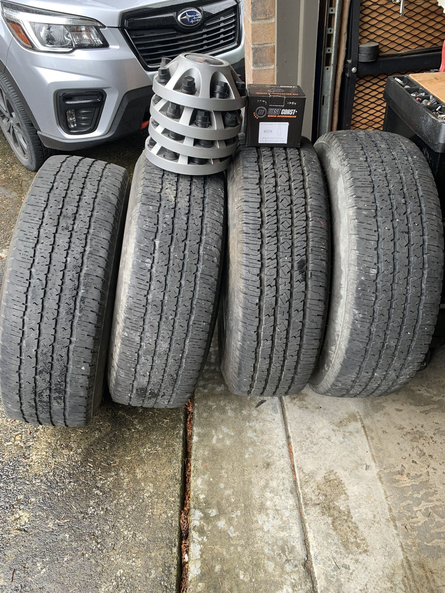 Four tires plus covers