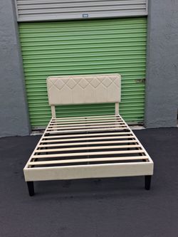 Beige full size bed frame