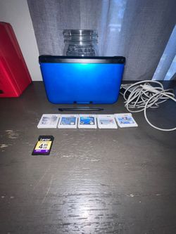 Nintendo 3ds XL Blue Black With 5 3ds Games 4gb Sd Card Charger And Stylus