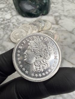 Morgan silver dollar (Round)