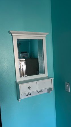 Mirror with hanger and two drawers