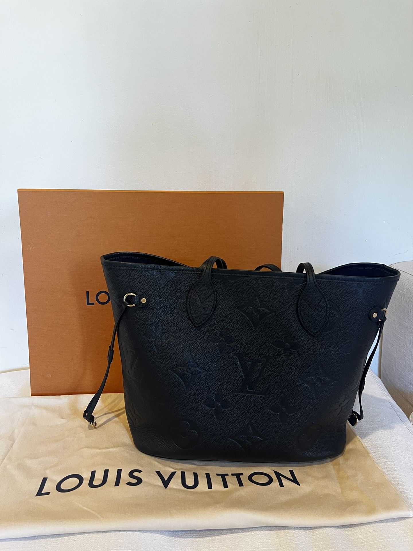 Louis Vuitton never full MM Empreinte Leather