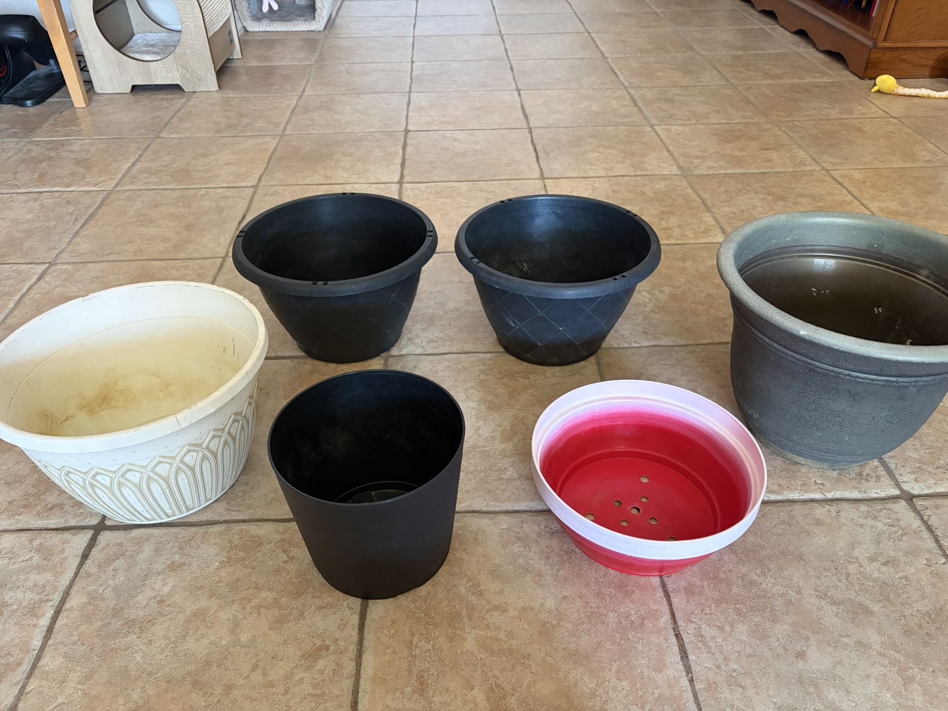 6 Resin & Plastic Flower Pots For $12