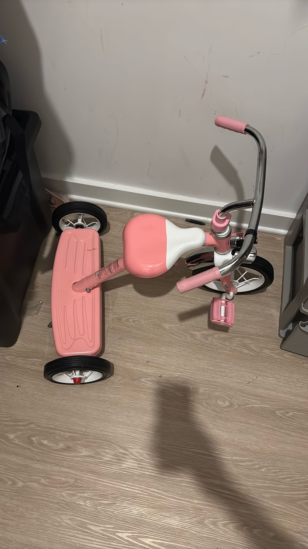 Pink tricycle