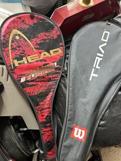 2- tennis rackets With Protector Sleeves