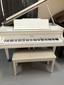 White Baby Grand Piano