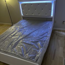 Queen Bedframe Paced In Boxes