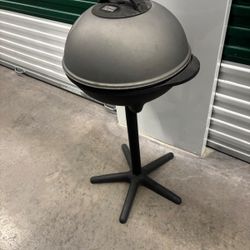George Foreman standing outdoor, electric grill… $50