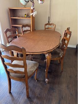Solid oak extendable dining table and 6 chairs