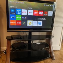 PANASONIC 42” TELEVISION ON STAND. 