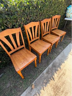 4 solid wood dining chairs $25
