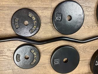 BRAND NEW: Standard Black Curl Bar with Cast Iron Weight Plates of 25s, 10s and 5 lbs. Total= 94 lbs