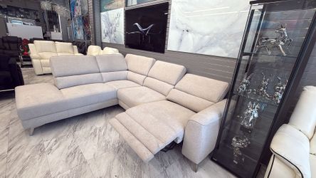 Sofa seccional reclinable