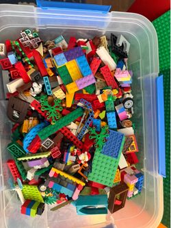 9lbs.  Legos  plus bin, 3 full sets, two cases and 3 base plates