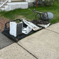 Scrap Metal On Sidewalk